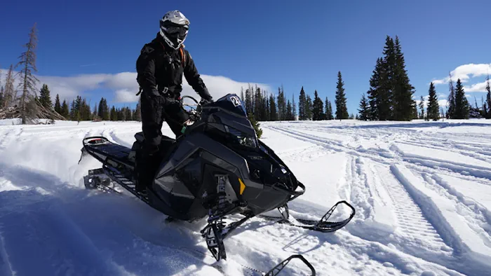Snowmobile in snowy landscape